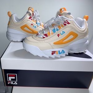 Fila Disruptor II‘s (bleached sand/flame orange)